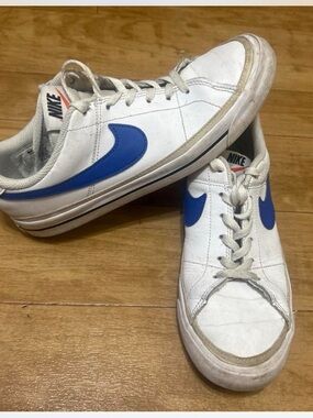 Nike White Leather Low-Top Sneakers with Blue Swoosh